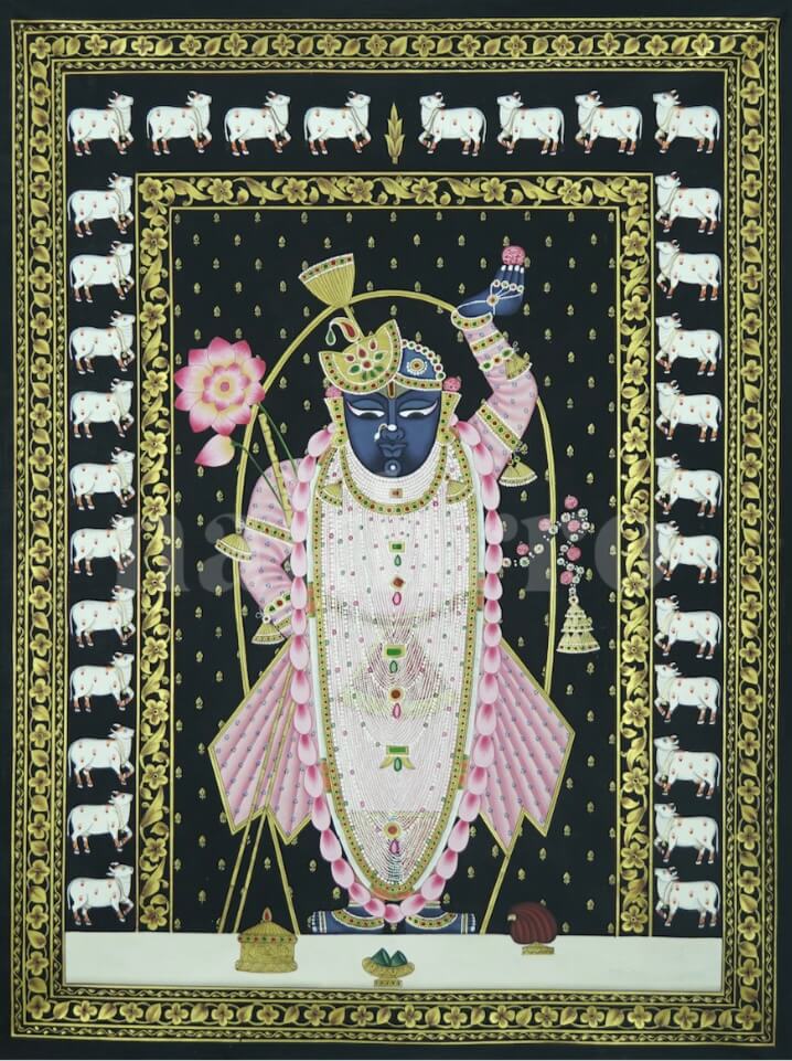 Hand-painted Shrinathji Pichwai on black with gold border, pink lotus garland and Kamdhenu cows