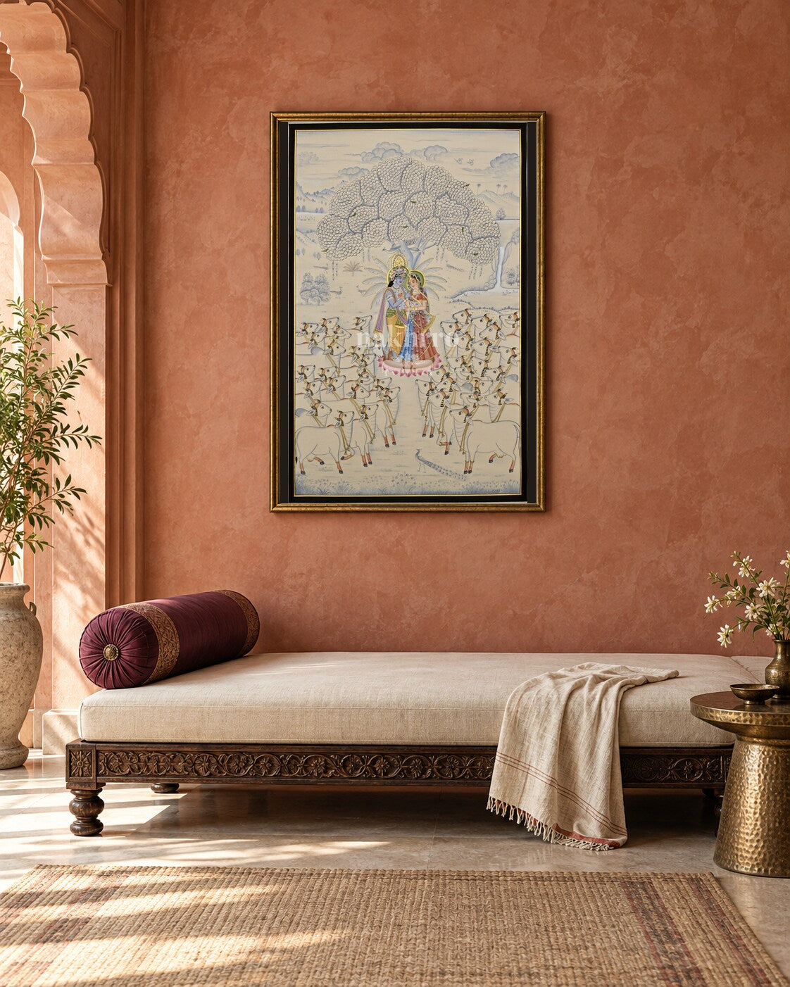 Radha Krishna Beneath the Kadamba Tree, framed above a daybed in a contemporary haveli interior; styling mockup