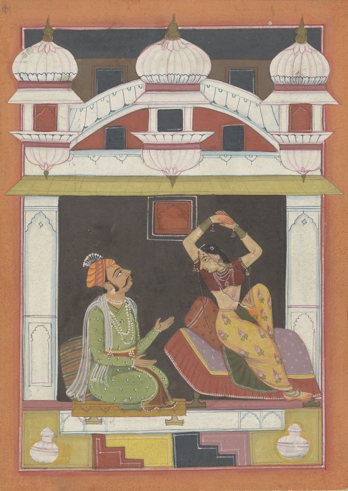 Women share a quiet musical moment below a triple-domed palace facade, with saturated red walls and a patterned terrace.
