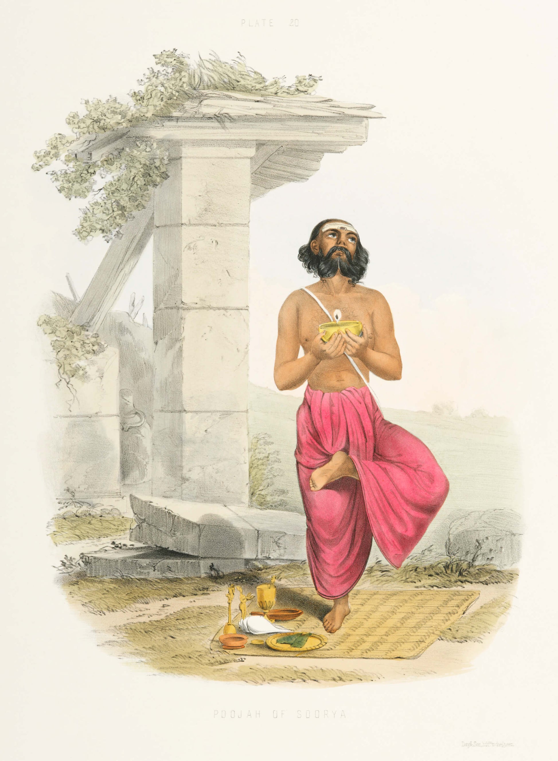 Man in pink dhoti standing in a meditative pose with offerings on the ground, against a classical architecture background.