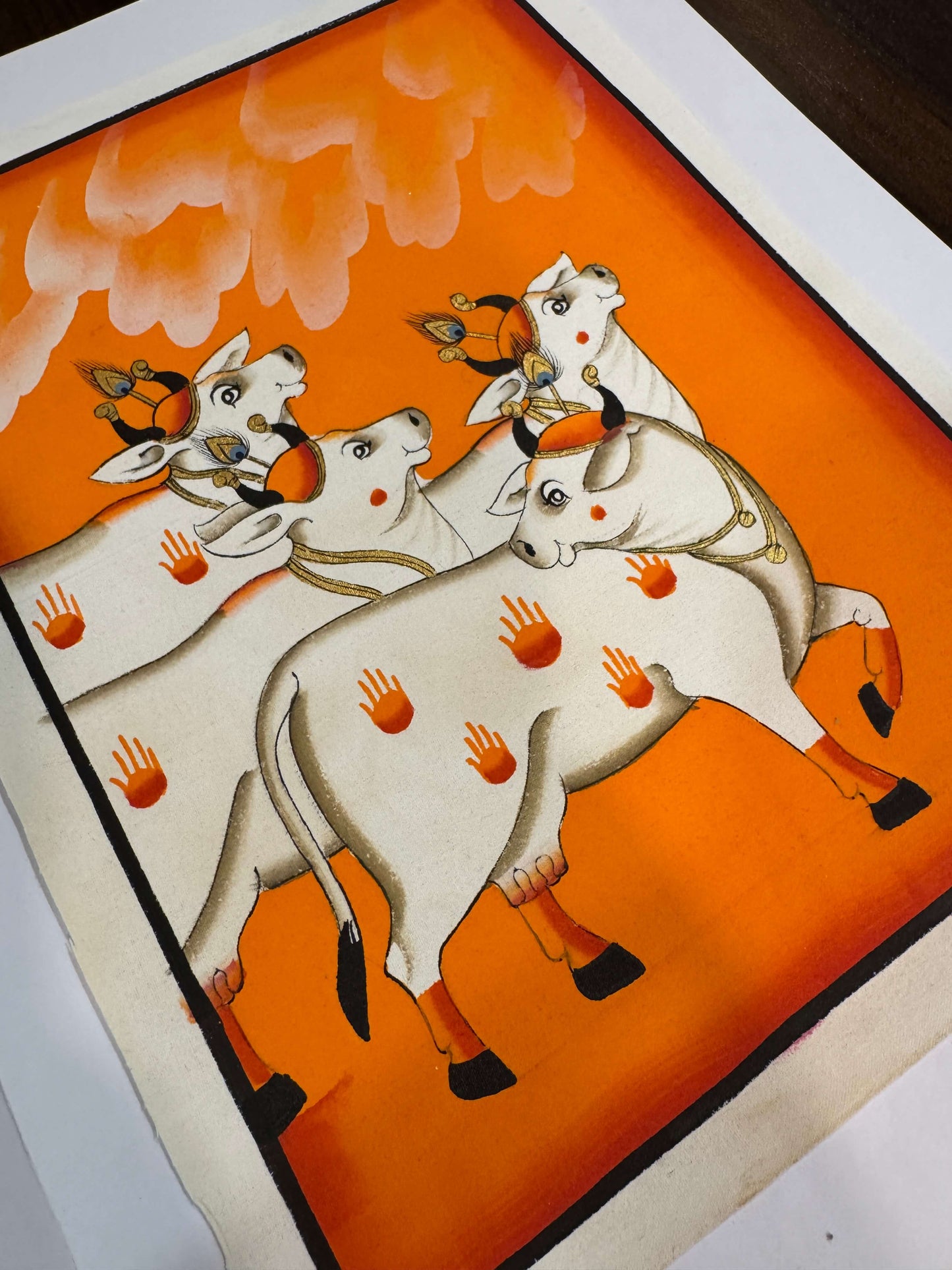 Sacred Cow Procession – Original Pichwai Painting on Cotton Cloth | Hand-Painted in Orange