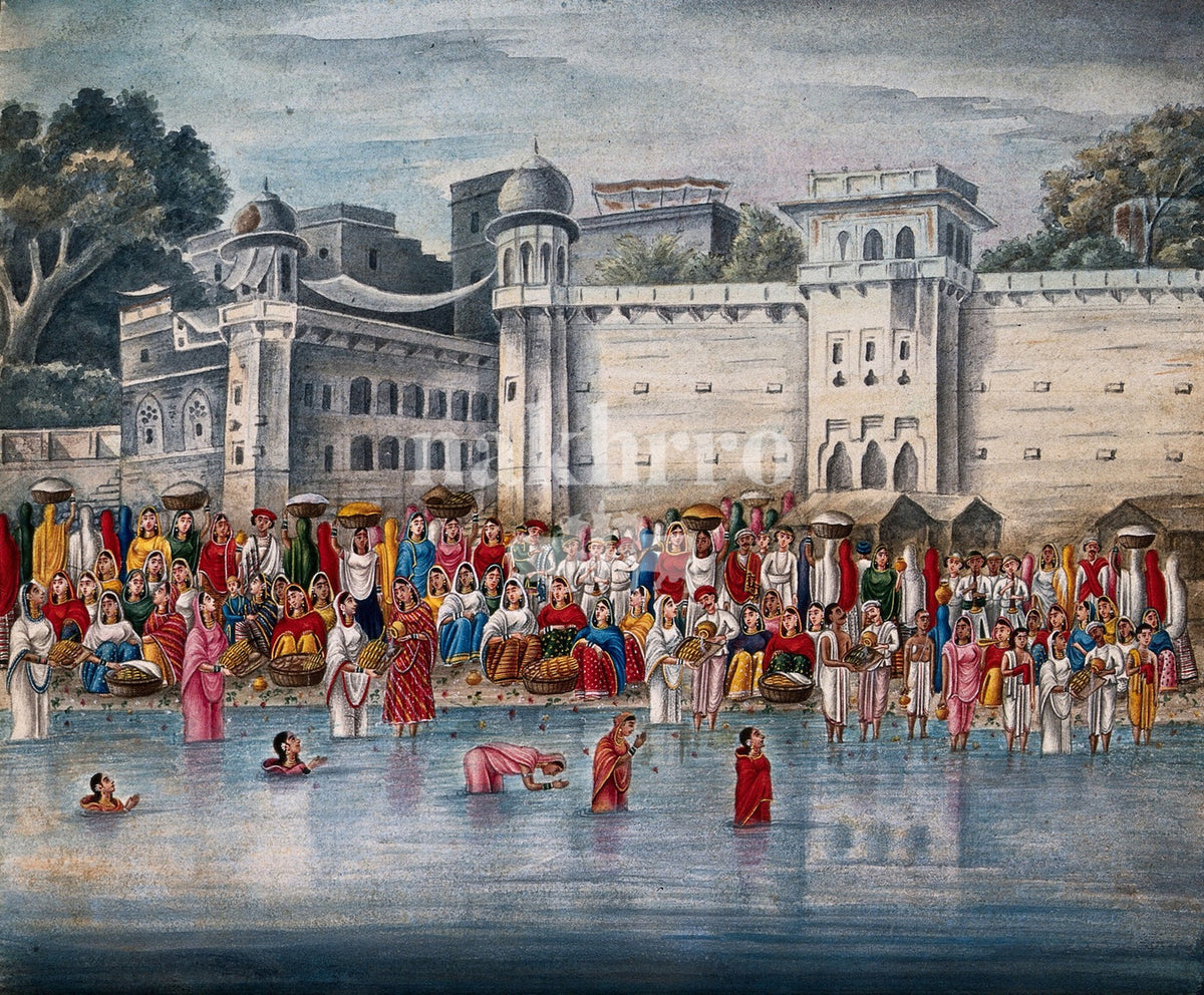 Busy Indian riverside ghat before grand historic architecture