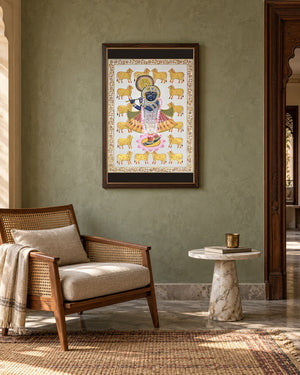 Krishna with Golden Cows and a Floral Border, framed in an Indian reading nook; styling mockup, 2 by 3 feet