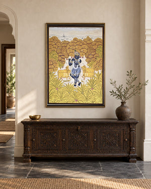 Krishna in an Ivory Forest Clearing, framed in a luxurious Indian console setting; styling mockup, 2 by 3 feet