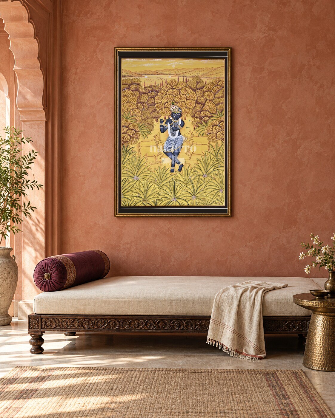 Krishna in Ochre Pastures, framed above a daybed in a contemporary haveli; styling mockup, 2 by 3 feet