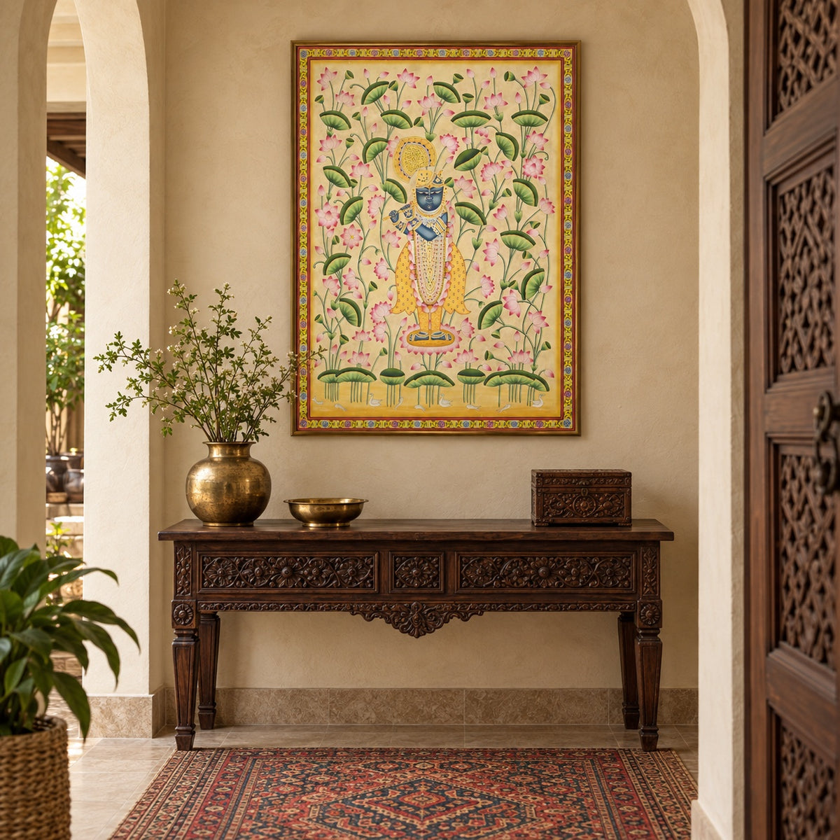 Krishna Among Pink Lotuses Pichwai print styled in a cosy Indian entryway.