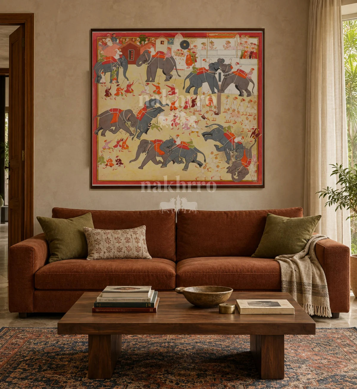 Room styling illustration of Royal Elephant Battle Scene above a rust sofa