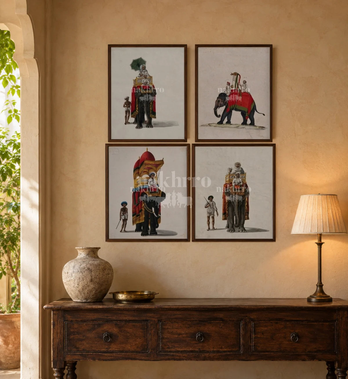 Room styling illustration of four Royal Elephant Procession prints above a wooden sideboard