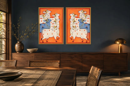 Orange Cows Pichwai gallery wall set of two in a dining room