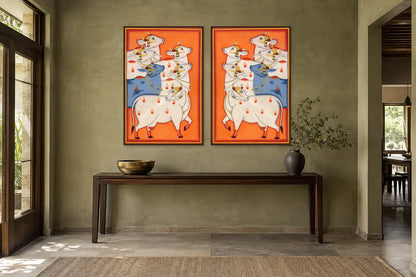 Orange Cows Pichwai gallery wall set of two in a passage