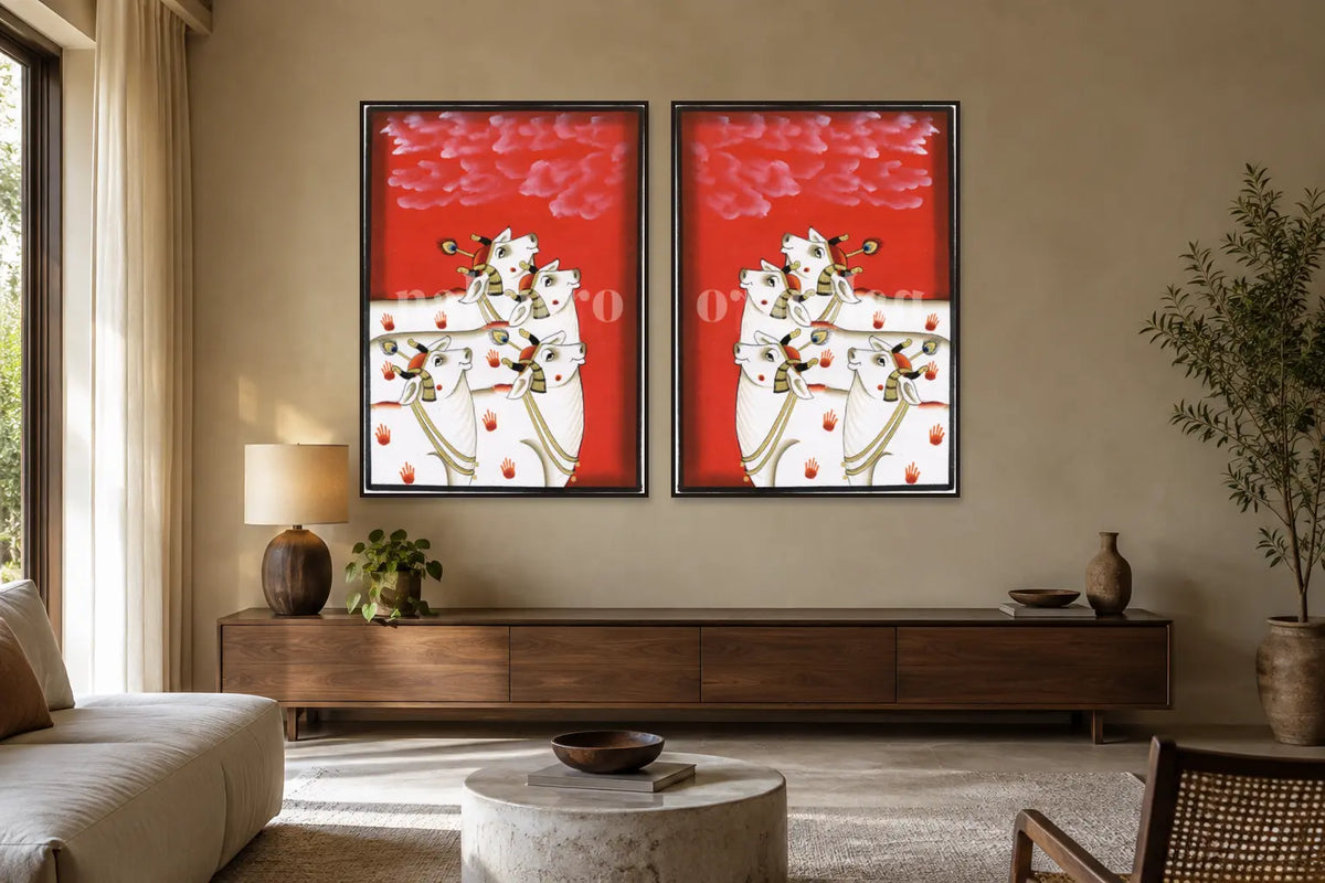 Red Kamdhenu Pichwai gallery wall set of two in a living room