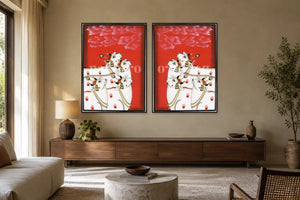 Red Kamdhenu Pichwai gallery wall set of two in a living room