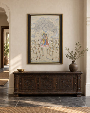 Radha Krishna Beneath the Kadamba Tree, framed in a luxurious Indian console setting; styling mockup