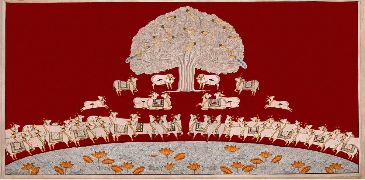Horizontal red Pichwai artwork with white cows, Tree of Life, birds and a lotus pond