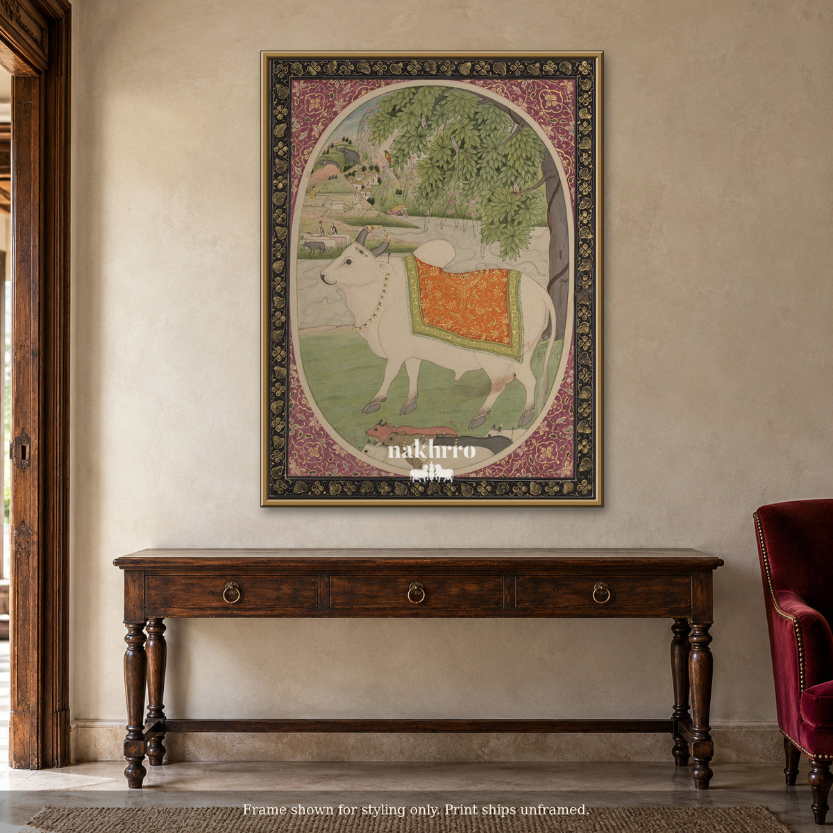 The White Cow Beneath the Trees — warm foyer framed styling mockup, print ships unframed